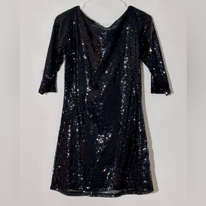 Sequins dress. Above the knee length. Worn once. Great fit.